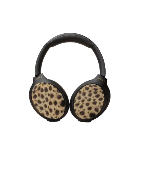 Cheetah-print headphone covers with yellow and brown spots