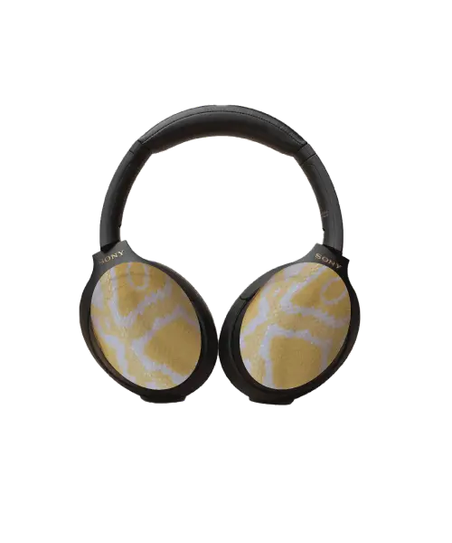 Snakeskin pattern headphone covers with scaly yellow texture 