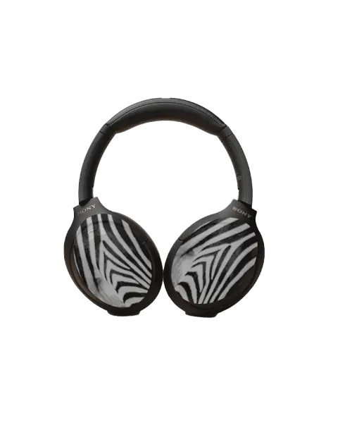 Zebra-print headphone covers with black and white stripes